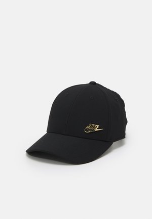 Black baseball cap made of fabric with a curved brim. Features a golden Nike logo on the front. Structured design with six panels.