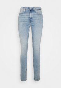 Ljusblå skinny jeans med hög midja, tillverkade av denim, med fem fickor och en klassisk knapplåsning samt dragkedja.