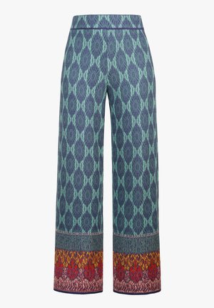 Pantalon à jambes larges avec un motif de diamants bleu sarcelle et bleu marine, ornée d'une bordure multicolore florale et géométrique à l'ourlet.