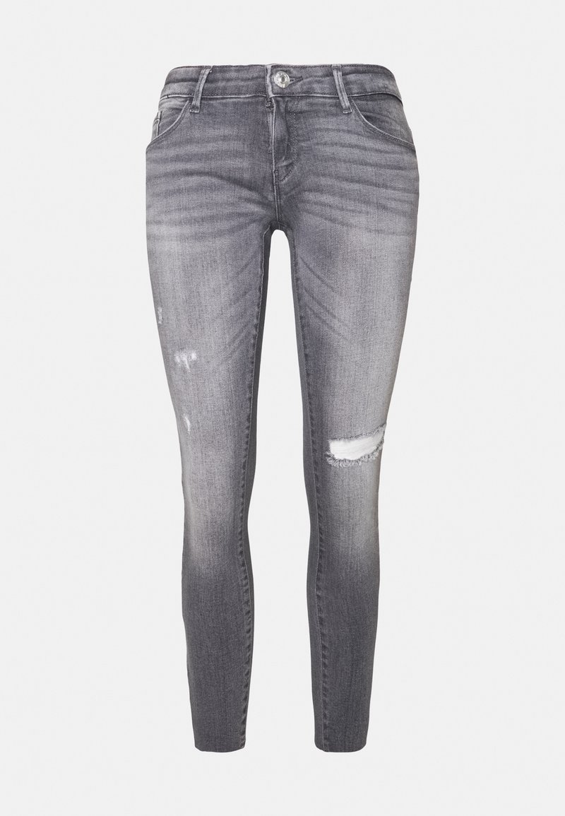 Smala jeans i blekt grå denim, med en slitning på knäet som har en reva, femficksdesign och subtila slitningar.