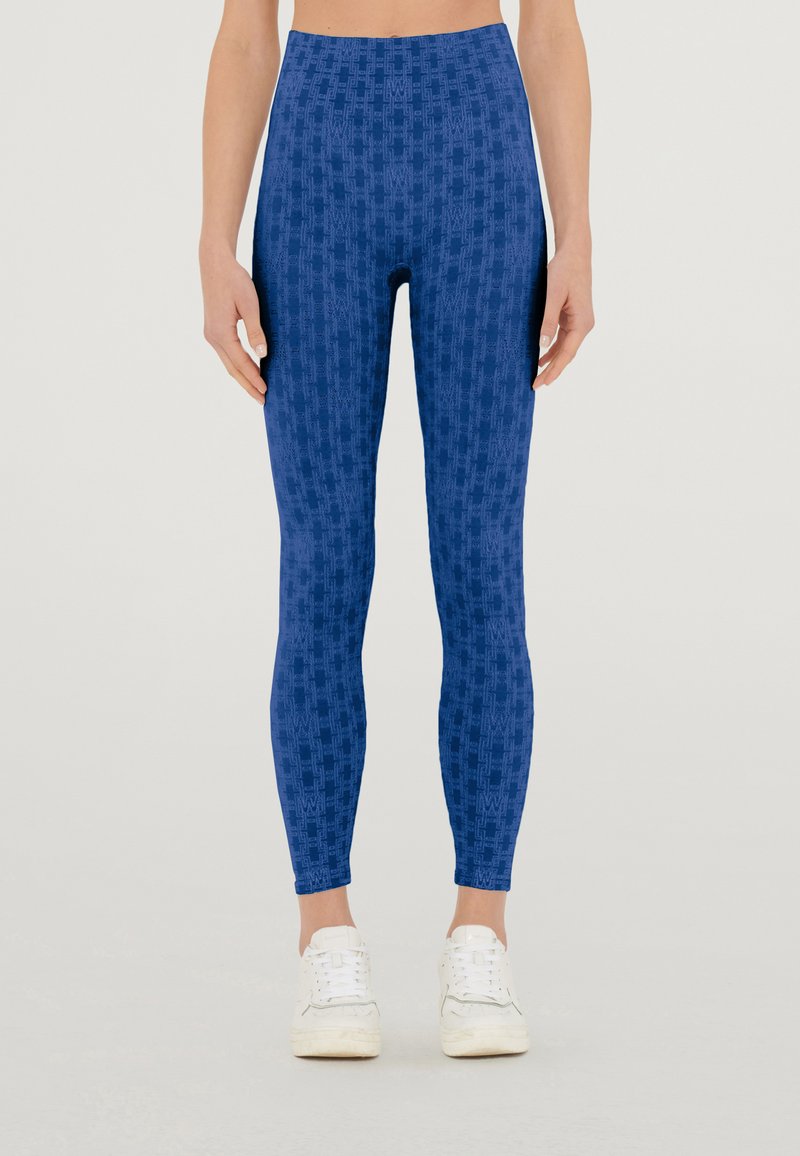 Wolford SUCCESSION LOGO CHAIN - Leggings - Trousers - sodalite blue ...