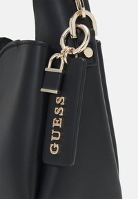 Guess IWONA - Handbag - black