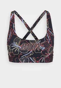 Black sports bra featuring a colorful floral design in red, yellow, and blue. Cross-back straps and "ROXY" logo on the front.