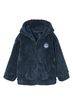 Navy blue fleece hoodie featuring a zip closure, furry texture, front pockets, and an embroidered patch on the chest.