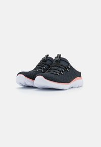 Black mesh athletic shoes with elastic laces, a white midsole, and a coral accent at the heel, featuring a lightweight, breathable design.