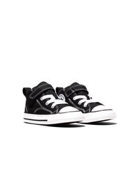 Zapatillas altas para niño pequeño en blanco y negro con cordones blancos, correas de velcro y un logo redondo en el lateral.
