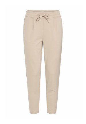 Pantalones jogger beige de tela suave, con cintura elástica con cordón, dos bolsillos frontales y perneras ajustadas para un ajuste ceñido.