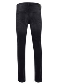 Svarta denimjeans med slim fit, med en medelhög midja, två bakfickor och vinklade sömmar på fickorna.