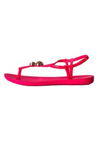 Infradito rosa in gomma con suola testurizzata, dotati di una fascia tra le dita e due palline decorative metalliche sulla parte superiore. Cinghietta regolabile per la caviglia.