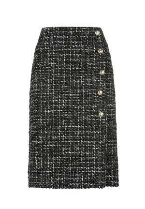 Black and white tweed skirt with a straight cut, featuring five decorative gold-tone buttons along the left side. Structured texture.