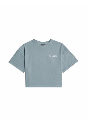 T-shirt court bleu clair à manches courtes avec un petit logo blanc "G-Star" sur le côté gauche de la poitrine.