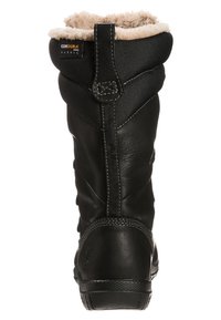 Bota de invierno negra fabricada en cuero y tejido Cordura con un forro suave y peludo en la parte superior. Cuenta con suelas texturizadas y costuras reforzadas.