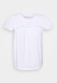 Vit bomullst-shirt med en smockad design över axelpartiet, korta puffärmar och en avslappnad passform med rak nederkant.