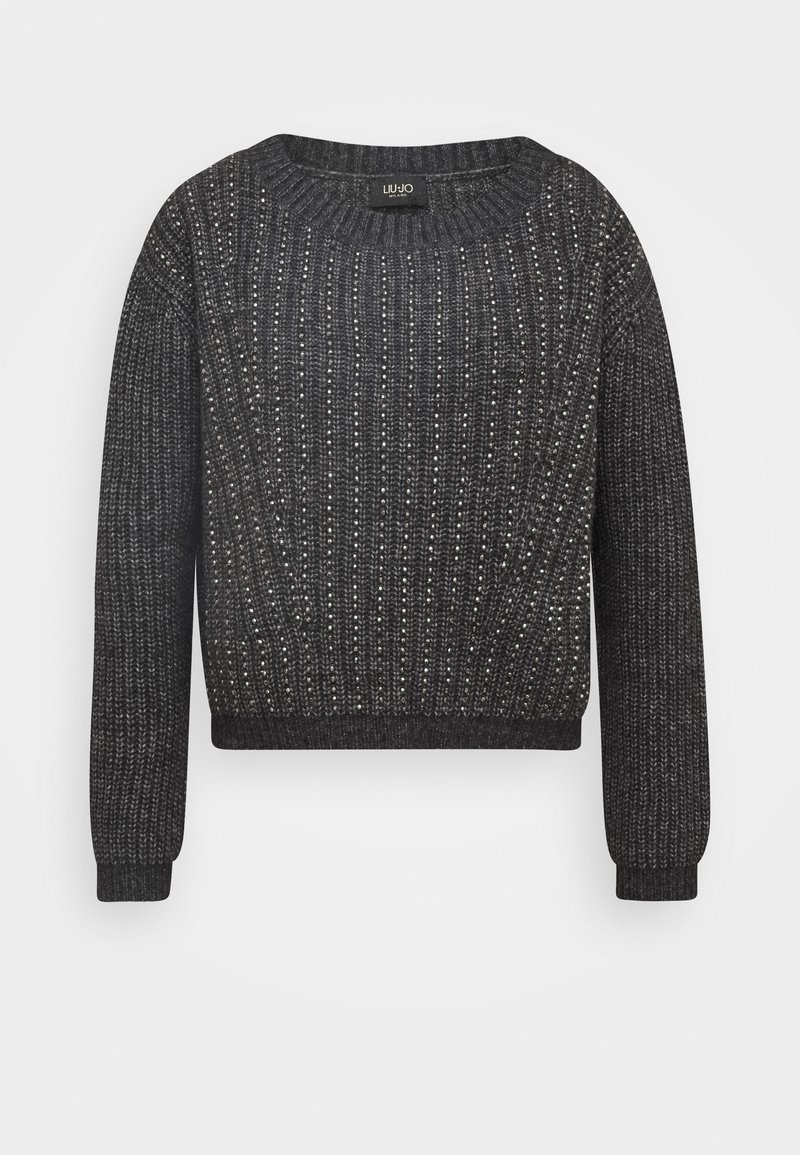 Pull en maille côtelée gris foncé à manches longues avec de petites décorations brillantes sur tout le tissu, col rond.