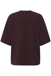 Mørk burgunder oversized t-skjorte med korte ermer vist fra baksiden, med rund hals og enkelt sømløst design.