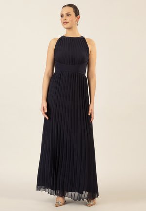 Langes, navyblaues, plissiertes Kleid mit Rückenfree-Design, tailliertem Oberteil und fließendem Rock, der in einen durchsichtigen Saum übergeht.
