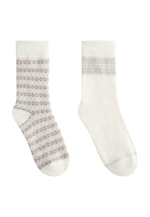 Kötött zoknik, bal oldalon mintás szürke és fehér dizájnnal; a jobb oldalon egyszínű fehér. Puha tapintás, bordázott mandzsettával.