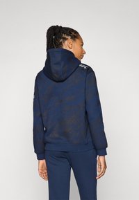 Felpa blu navy con un motivo testurizzato, dotata di cappuccio con coulisse e polsini a coste, con un piccolo logo sulla spalla.