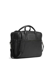 Fekete bőr laptop táska, két fogantyúval és leválasztható vállpánttal. Fő rekesze cipzáros, valamint elülső zsebe is van.