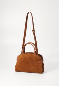 Brown suede handbag with a structured shape. Features two top handles and an adjustable shoulder strap. Smooth leather accents.