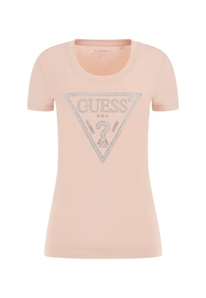 T-shirt di cotone rosa chiaro con maniche corte, scollo a barca e un logo triangolare argento sul davanti con la scritta "GUESS U.S.A." in lettere maiuscole.