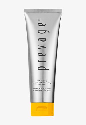 Tube argenté du nettoyant booster de traitement anti-âge Prevage avec bouchon jaune à bascule, présenté sur un fond blanc uni.