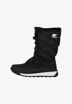 Black insulated snow boot with quilted design, faux fur collar, lace-up front, and white rubber sole. Features logo on side.