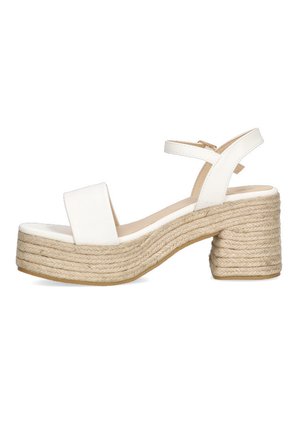 Zapatos de plataforma blancos con un tacón de bloque envuelto en yute texturizado, con una correa ancha y una correa de tobillo ajustable para mayor soporte.