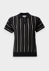 Polo noir à manches courtes avec des rayures verticales beige, deux boutons noirs et un petit col sur un fond uni.