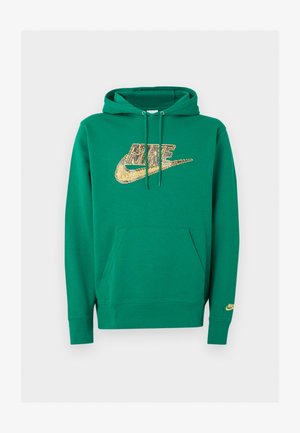 Sweat à capuche Nike vert avec poche avant et logo Nike pixellisé doré sur la poitrine et petit logo sur le poignet gauche.