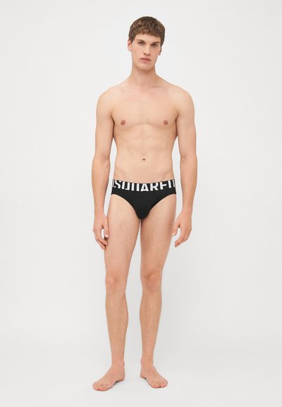 Black men's briefs with a white logo on the waistband, made of smooth fabric, featuring a snug fit and a classic cut.