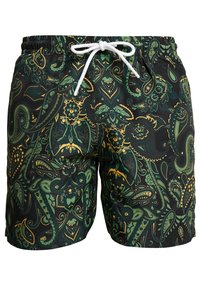 Schwarze Badehosen mit einem komplizierten grünen und gelben Paisleymuster, elastischem Bund und weißem Kordelzug sowie glatter Stoffoberfläche.