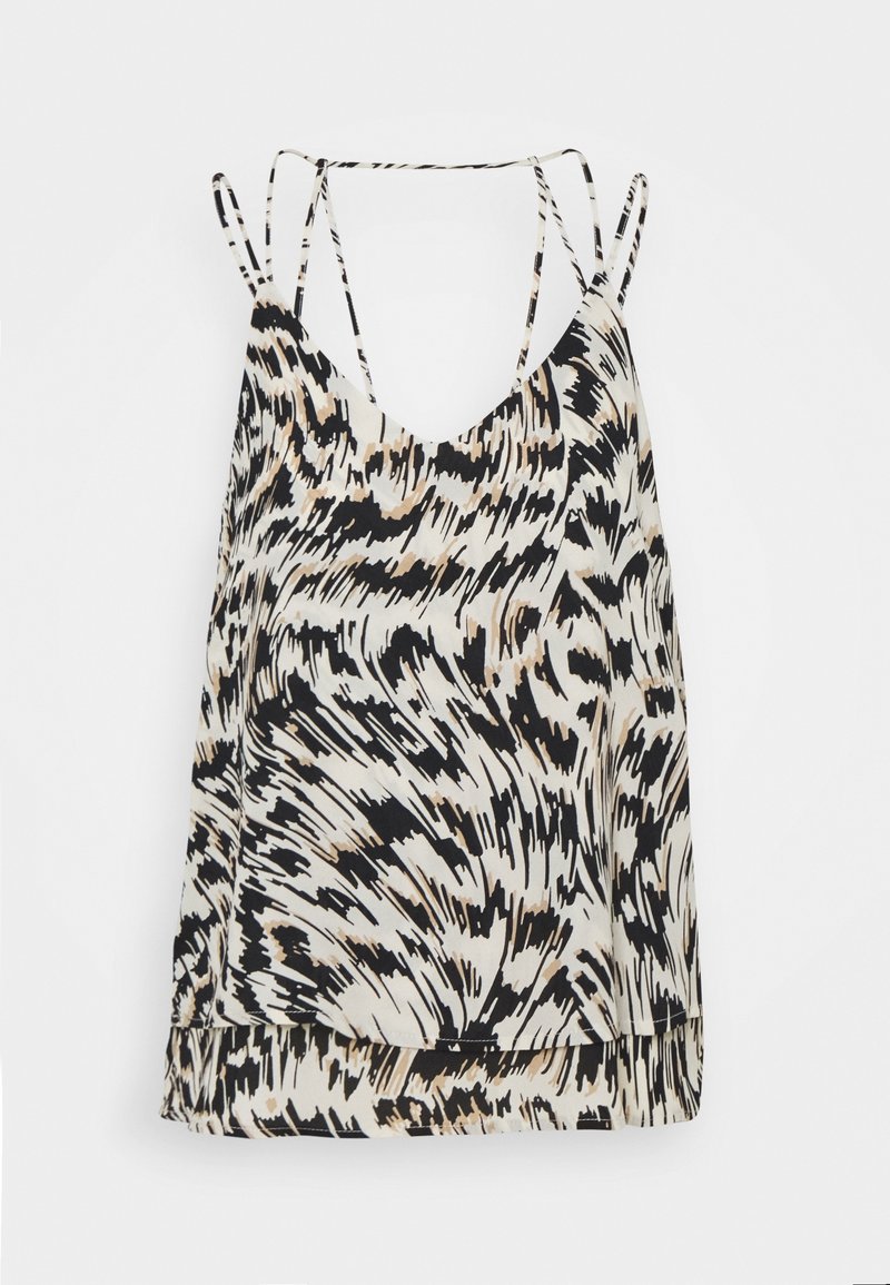 Haut sans manches pour femme avec imprimé animalier abstrait en noir, beige et blanc, doté de fines bretelles doubles, sur fond blanc.