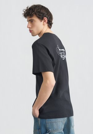 GRAPHIC SLOGAN RELAXED TEE - T-shirt basique - puma black