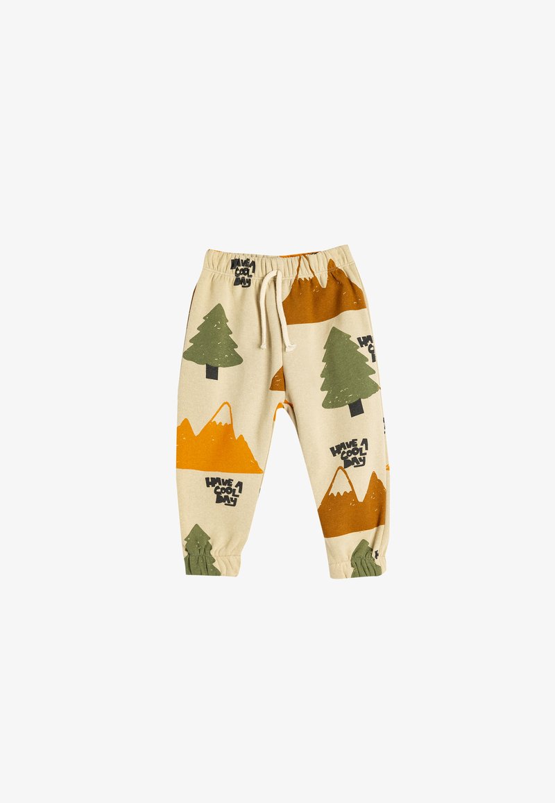Bomulds joggers med elastisk talje, mønstret med træer og bjerge i grønne, orange og beige nuancer. Har snoretræk og manchetter.