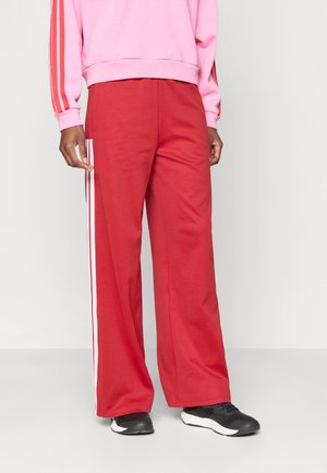 HER - Donji dijelovi trenirke - active maroon/clear pink