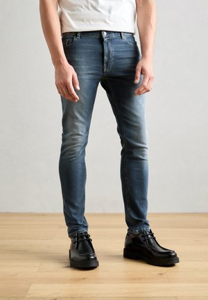 TROUSERS LOW WAIST - Kitsa lõikega teksad - dark blue