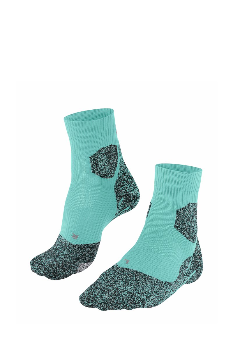 Türkise Knöchelsocken mit einem strukturierten Muster und schwarzen Akzenten, aufrecht vor einem weißen Hintergrund platziert.