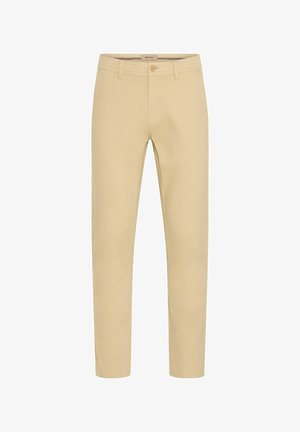 Beige chinos med slim passform, laget av bomull. Har knapp og glidelås, frontlommer og en jevn, matt tekstur.