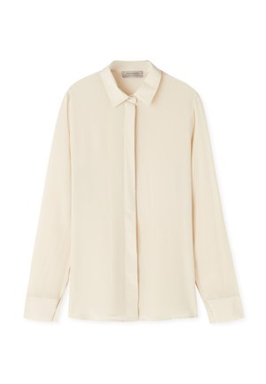 Krämfärgad blus i ett mjukt tyg, med klassisk krage, knäppning fram och lång ärm med cuffs.