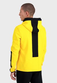 sweat le coq sportif orange