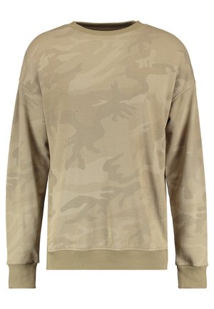 Khaki hettegenser med et subtilt camouflasjemønster. Lange ermer med ribbestrikkede mansjetter og nederkant, laget av et mykt stoff.