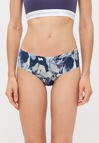 Chiloti de bikini multicolori cu un model abstract în tonuri de violet și crem, realizati dintr-un material moale, cu un design ajustat și talie elastică.