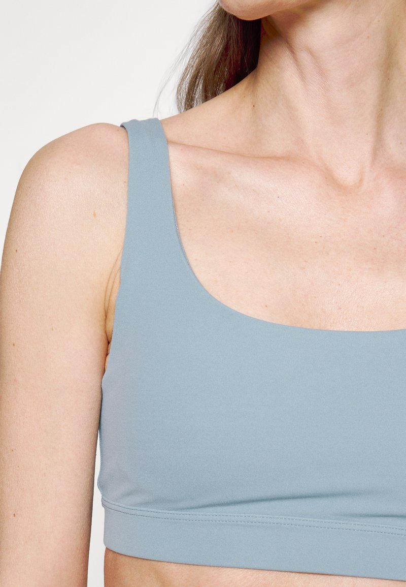 Damen Sportbekleidung | Athleta EXHALE BRA A-C Sport-BH mit leichter Stützkraft minimalistic grey/grau - JX47862 Damen Sportbekleidung | Athleta EXHALE BRA A-C Sport-BH mit leichter Stützkraft minimalistic grey/grau - JX47862