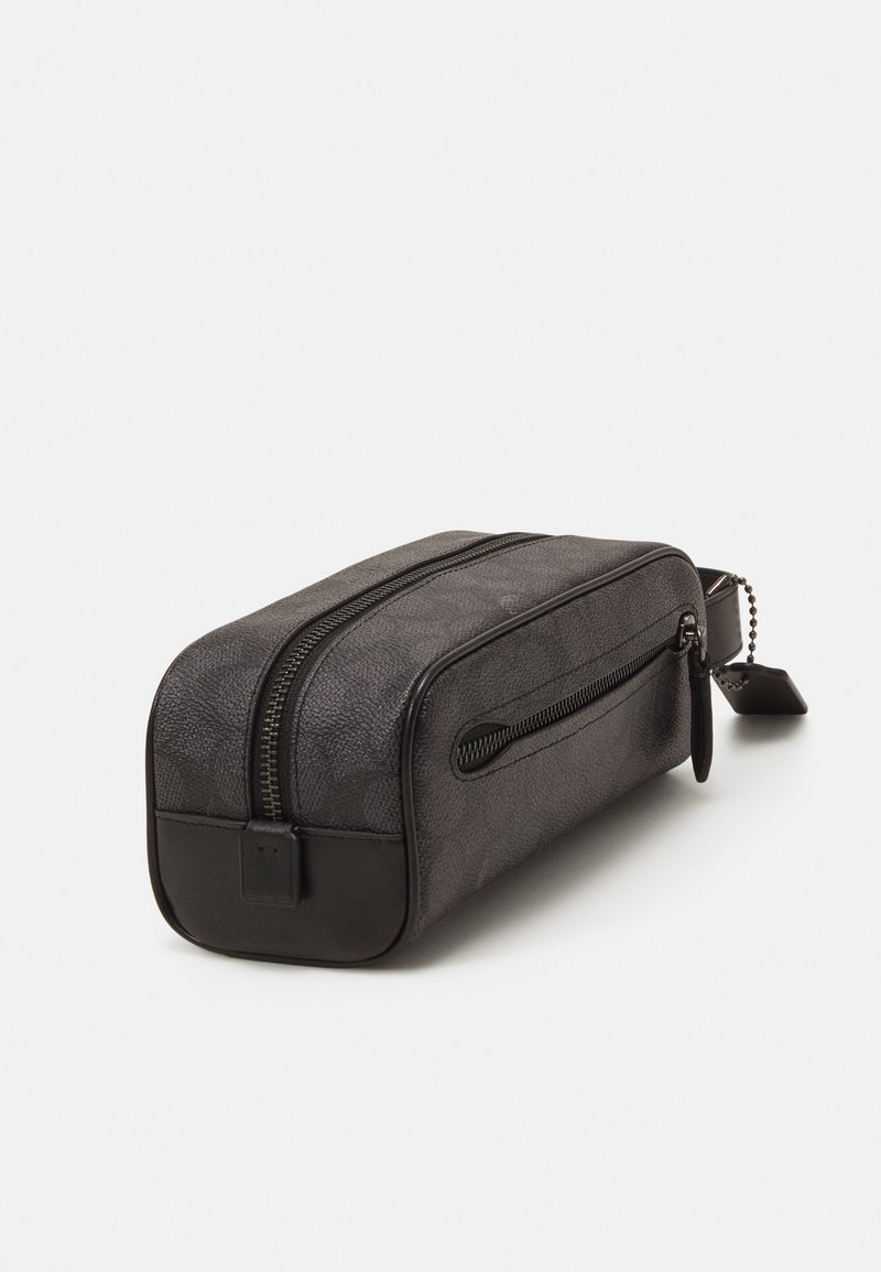 coach travel toiletry bag Purse: Brown Kit Smooth calf leather Inside multifunction pocket Zip closure fabric lining Handle with 1 1/2 drop Outside open pocket 10 1/4 (L) x 5 1/4 (H) x 4 3/4 (W) Style No. Coach Travel Kit Coach Toiletry