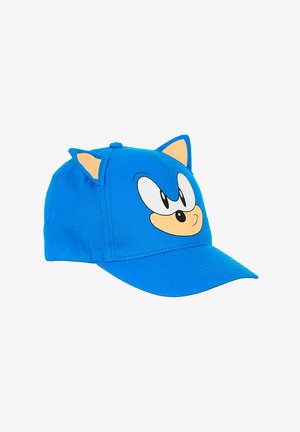 Cappellino da baseball blu con occhi, naso e orecchie da cartone animato che ricordano un personaggio di riccio su uno sfondo bianco uniforme.