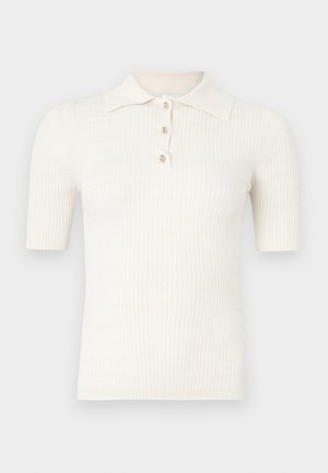 Kreminės spalvos ribbato polo marškinėliai trumpomis rankovėmis, su lygia apykakle ir trimis dekoratyviniais mygtukais prie kaklo. Lygios tekstūros.