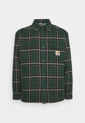 Grønternet flannel skjorte med to brystlommer, knaplukning og et logo patch. Har en afslappet pasform og blød tekstur.