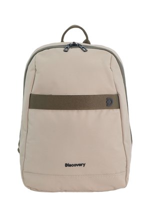 Beige rectangular backpack with olive green horizontal strap, top handle, double zipper, and "Discovery" logo on the front pocket.