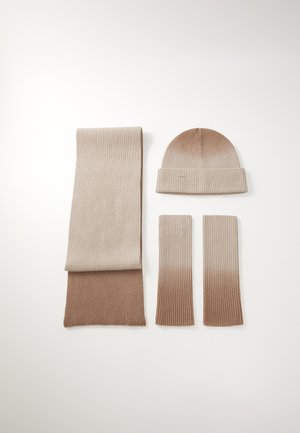 Beige neulehattu, huivi ja sormettomat hanskat. Ribbikuvio, jossa on asteittainen siirtymä vaaleasta tummanbeigeen. Yksinkertainen muotoilu, ilman koristeita.